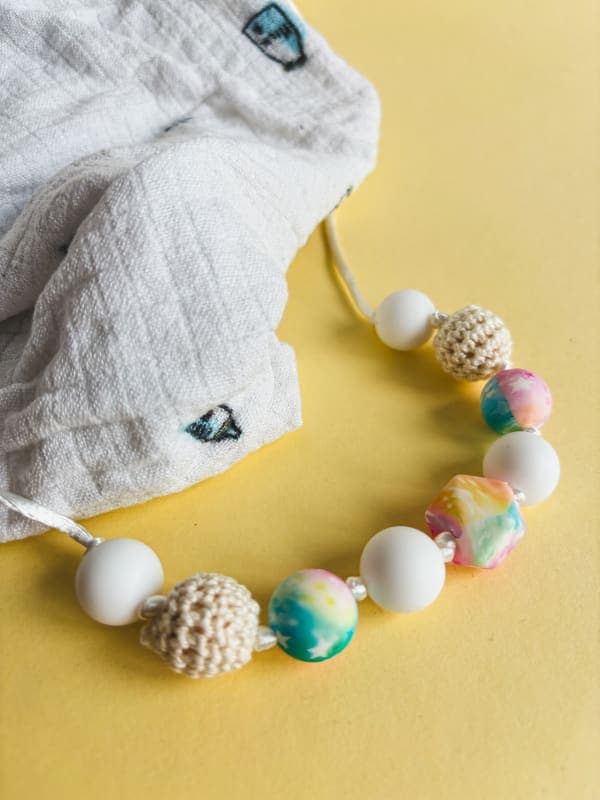 🧸✨ Слінгобуси “Ніжний комфорт” — сенсорні намиста для мам і малюків